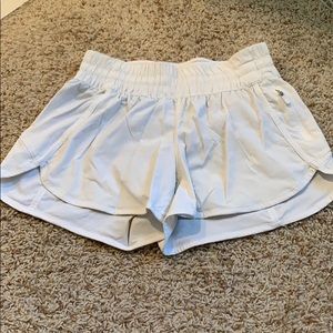 white lululemon tracker shorts!!